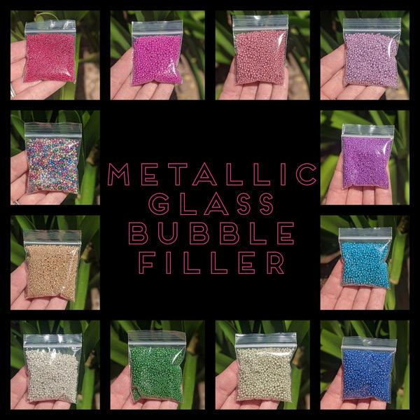 Metallic Glass Bubble Filler